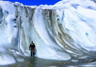 Photo of Man standing on Exit Glacier